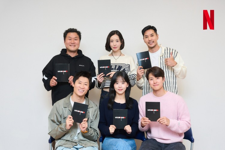 The cast of Husbands in Action