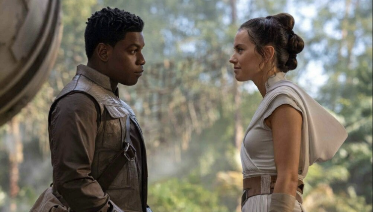 John Boyega and Daisey Rildey as Finn and Rey in Star Wars